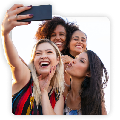 A group of content creators taking a selfie together.